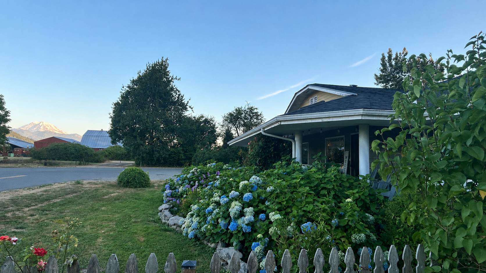 Puget Sound area home with garden and mountain view